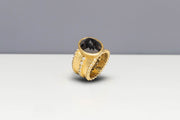 Todd Reed ring with fancy diamonds(~8.72ct), white brilliant cut diamonds (~.36ct), and 18k yellow gold